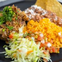 Carnitas Combo · Includes rice and beans.