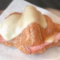 Ham & Gruyere Croissant · Sliced ham and lots of gruyere cheese are melted inside one of our fresh butter croissants.