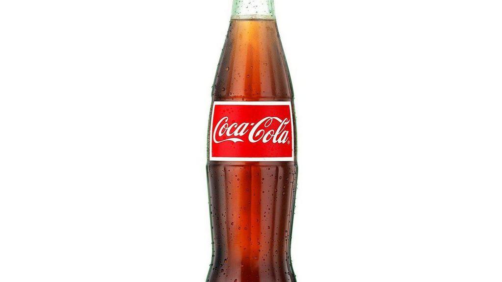 Bottle Of Coca-Cola® · A 12 oz. glass bottle of Coca-Cola®. A product of The Coca-Cola Company.