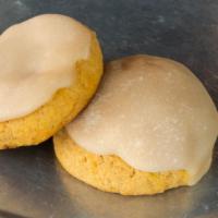 Pumpkin Cookies (2) · A pair of Mama Linda's Pumpkin Cookies, coated with a brown sugar glaze.