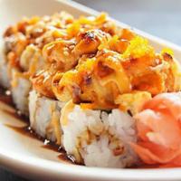 Tnt Roll · Crabmeat, avocado, topped with torched tuna, salmon, crab salad, and masago with creamy spic...
