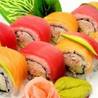 Rainbow Roll · Crab salad, avocado, and cucumber topped with avocado and assorted fish.
