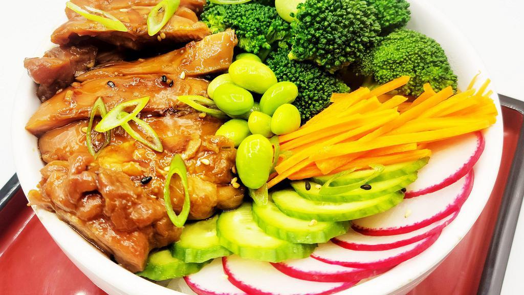 Chicken Teriyaki Bowl · Teriyaki chicken, broccoli, cucumber, radish, carrot, edamame, green onion, sesame seeds, and homemade teriyaki glaze over the top.