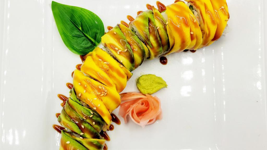 Nw Tropical Sunshine Roll · Crab salad, cucumber, topped with mango and avocado.