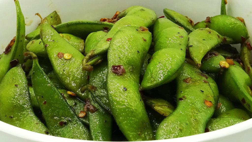 Spicy Garlic Edamame · Organic edamame lightly seasoning with homemade spicy garlic sauce ( perfect for snacking with beer)