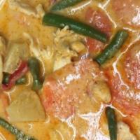 Gaeng Panang · Panang curry cooked in coconut milk with assorted vegetables, kaffir lime leaves, and your c...