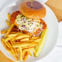 Crispy Chicken · Boneless fried chicken breast, Cheddar cheese, bungalow slaw, red onion, tomato, mayonnaise ...