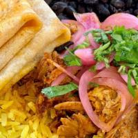 Cochinita Pibil Bowl · Slow cooked pork in Yucatan spices, yellow rice, black beans, cilantro, pickled red onions, ...