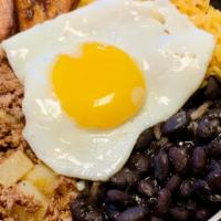 Platillo Cubano · Grandma's recipe!! 
Ground beef with potato, black beans, yellow rice, fried plantains, topp...