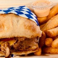Cubano Sandwich Combo · Cuban roast pork, chipotle mayo, grilled onions, pickles, banana peppers and mustard, all in...