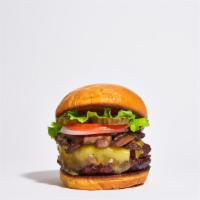 Swiss Army Burger · Seasoned half-pound angus patty perfectly cooked to medium, topped with topped with mushroom...
