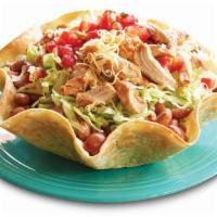 Taco Salad · Baked tortilla shell, refried beans, cheese and pico de gallo. 580 Cal.