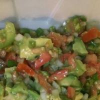 Avocado Salad · Chopped avocado with onion, tomato, green pepper, lime juice, olive oil, and salt for taste.