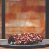 Baby Back Ribs · Baby back ribs choice of sweet gochujang sauce or soy garlic.