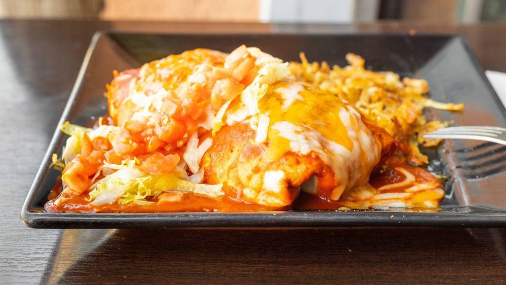 Carne Burrito · Melt in you mouth carne adovada red Chile, cheese, and beans comforted by a warm tortilla, then smothered in red Chile and cheese.