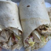 Chicken Bacon Ranch Wrap · Fresh grilled chicken tossed in lettuce, tomato, shredded jack, and cheddar cheese and house...