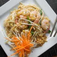 Pad Thai · Popular rice noodles stir fried in sweet tamarind sauce with bean sprouts, green onions, egg...