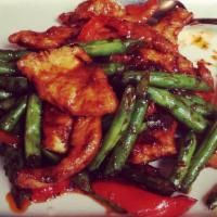 Pad Prik King · Chefs recommended. Crispy chicken tenders with green beans in house made chili paste.