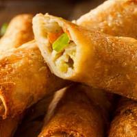 Vegetable Spring Rolls · 4 pieces. Mixed vegetables wrapped in rolls of rice paper and deep fried.