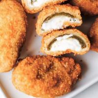 Jalapeno Poppers · 6 breaded Jalapeños filled with Cream Cheese.  Served with Ranch and Jam for dipping.  Doubl...