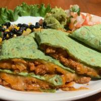 Cheesy Chicken Quesadilla · A huge spinach tortilla filled with baja style chicken breast and melted cheese. Served with...