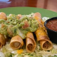 Veg 5 Rolled Tacos · Sliced vegan chicken breast hand-rolled inside corn tortillas, deep-fried and served with ve...