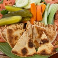 Veg Rabbit Platter · Fresh carrots, celery, tomatoes, cucumbers, pickles and grilled pita bread served with hummu...