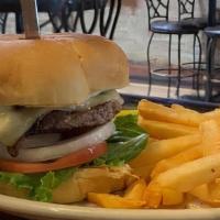 Garlic Mushroom Swiss Burger · Sautã©ed mushrooms with minced garlic & melted Swiss cheese atop our 1/3 lb. Patty served on...