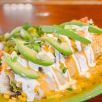Veg Chili Verde Burrito · A huge flour tortilla filled with seared, brined jackfruit, potatoes, and roasted green chil...