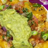 Fiesta Fries · Crispy fries topped with shredded chicken or beef and cheese. Includes sauce. Add Guacamole ...
