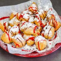 Zeppolis · Lightly fried dough tossed in powdered sugars topped with raspberry and chocolate sauce.
