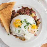 Corned Beef Hash · house made corned beef, onions, thyme, rosemary, new potatoes, two eggs any style, toast