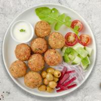 Fully Falafel · Baked and fried mixture of garbanzo beans, fava beans, coriander, cumin, parsley and onions....