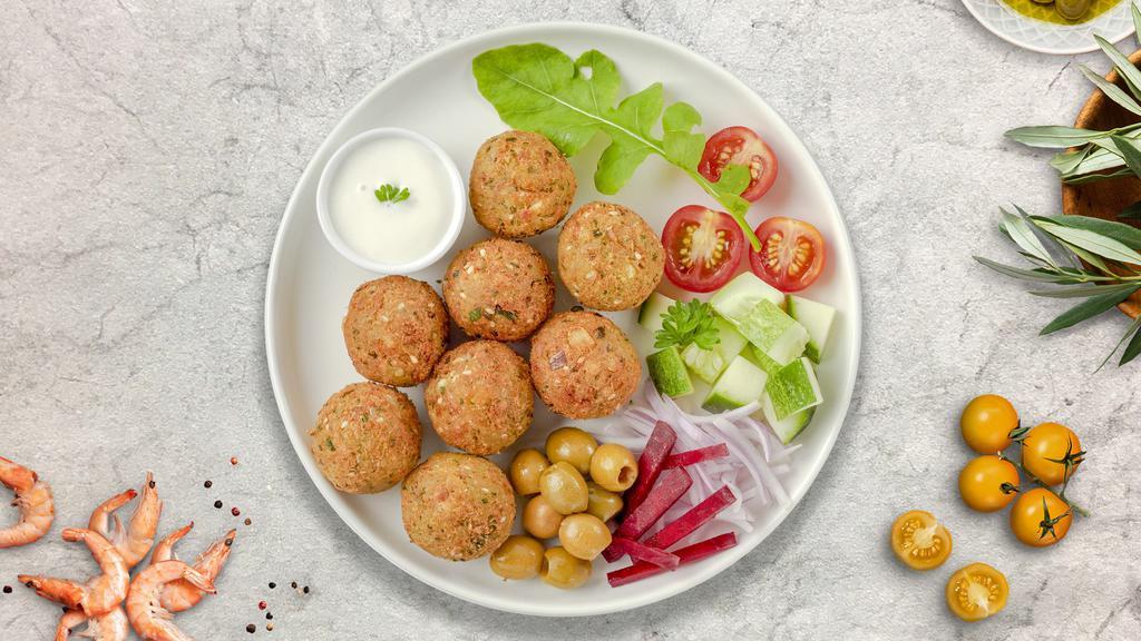 Fully Falafel · Baked and fried mixture of garbanzo beans, fava beans, coriander, cumin, parsley and onions. Mezzat.