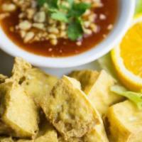 Thai Fried Tofu · Six pieces. Fresh tofu lightly fried and served with sweet and sour sauce.