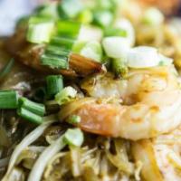 Pad Thai · Medium size rice noodles with egg, bean sprouts, onions, and ground peanuts.