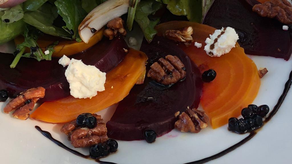 Beet Salad · Mixed greens, red onion, ricotta cheese, candied pecans, balsamic reduction