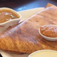 Chettinad Dosa · Crepe stuffed with onion, tomato and exotic gravy with Indian spices.