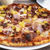 Aloha Pizza · Canadian bacon, pineapple, and bacon pieces on our house pizza sauce.