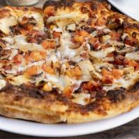 Chicken Bacon Ranch Pizza · Chicken, bacon pieces, tomatoes, and mushrooms with mozzarella cheese on our buttermilk ranc...