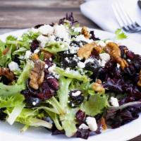 House Salad · Chopped Romaine with Cherry tomatoes, Olives, Red Onions and Feta. All dressed with balsamic...