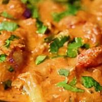 Chicken Tikka Masala · BAKED CUBED BREAST COOKED IN TOMATO AND COCONUT CREAM SAUCE