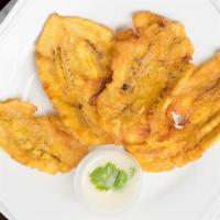Jumbo Tostones · Crispy fried plantains with garlic dipping sauce.