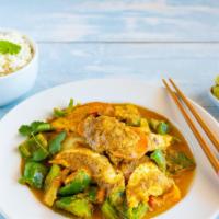 Yellow Curry · Coconut milk, bell pepper, onions, chilis, zucchini. Served with white rice.