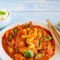 Red Curry · Coconut milk, bell pepper, onions, chilis, zucchini.