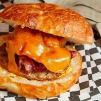 Croissant Sandwich · Toasted Croissant, Egg, Melted Chedder Cheese, And Your Choice Of Meat: Sausage, Bacon, Or B...