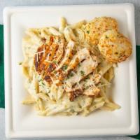 Blackened Chicken Pasta · Penne pasta tossed in our house alfredo sauce with a blackened chicken breast.