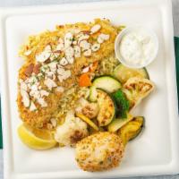 Wonderful Halibut · Egg washed and lightly breaded, served over rice pilaf with house made tartar sauce and your...