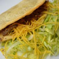 Beef Hard Taco · HARD SHELL
shredded beef, cheese and lettuce