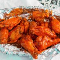 Buffalo Wings (Full Dozen) · Huge, meaty wings served with ranch dressing.
Blue Cheese available upon request.